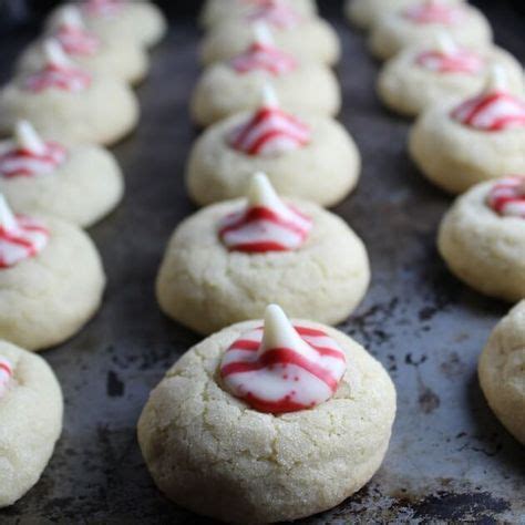 I changed up my regular christmas cookies a tad and decided to try a recipe that i had seen floating around pinterest. Thumbprint Sugar Cookies made w/Hershey's Candy Cane ...