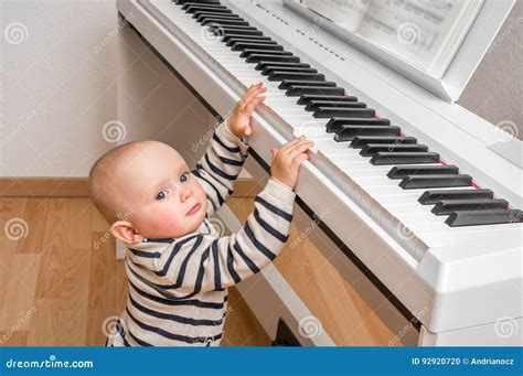 Cute Baby Trying To Play Piano Stock Photo Image Of Lessons Musical
