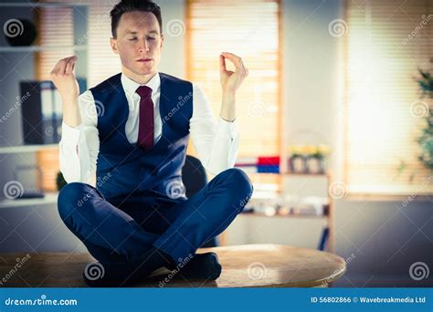 Calm Businessman Meditating In Lotus Pose Stock Photo Image Of Career