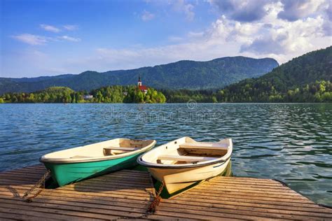 Iconic Bled Scenery Traditional Wooden Boats Pletna At Lake Bled