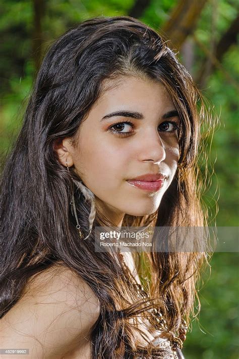 Portrait Of A Beautiful Latin Teenager Taken Outdoors Photo D