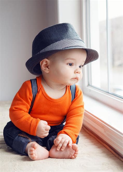 Cute Infant Baby In Hat Near Window Stock Image Image Of Funny