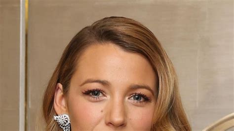 How Blake Lively Wears Two Holiday Staples Shimmery Eyeshadow And Red