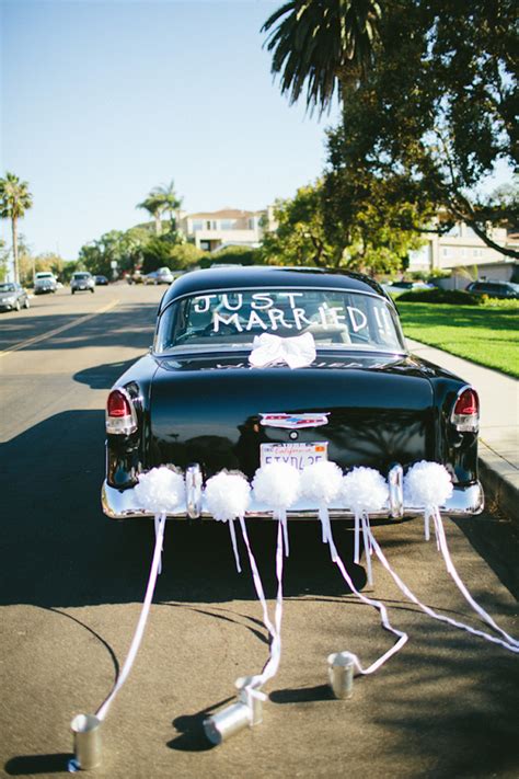Vintage Just Married Car With Tin Cans And Pom Poms