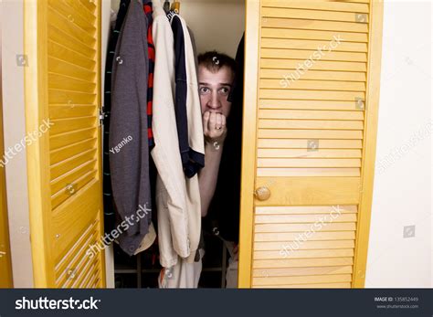 Man Hiding Closet Stock Fotografie 135852449 Shutterstock