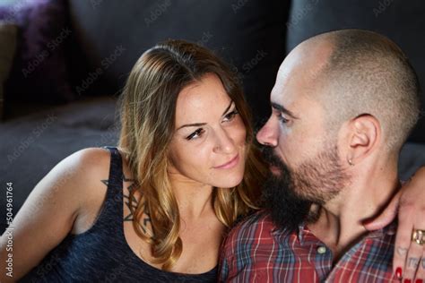 Couple In Love Looking Face To Face Portrait Of Romantic Couple Sitting Face To Face Against