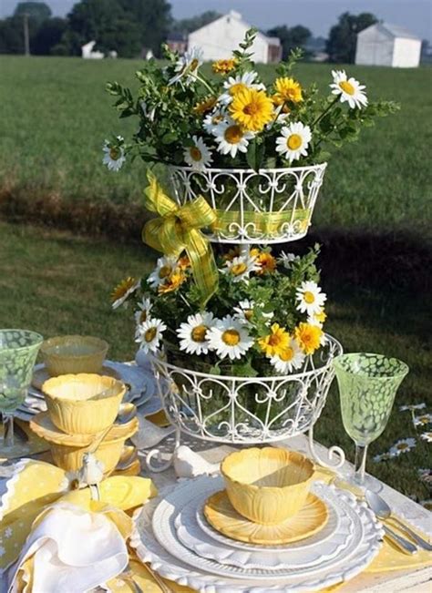 Any colored flower can be used to craft colored clay/glass blocks regardless of their flower type. Table decoration in green and yellow colors for a festive ...