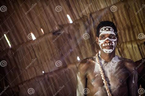 Portrait Of A Man From The Tribe Of Asmat People On Asmat Welcoming
