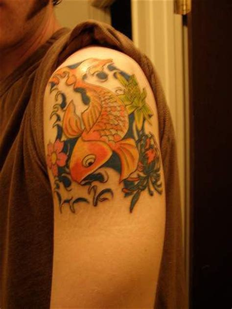 Yellow Koi Fish Tattoo On Shoulder Tattooimagesbiz