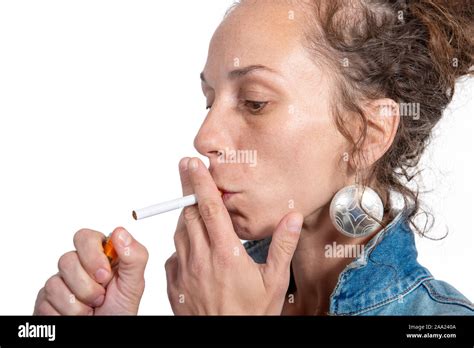 Beautiful Young Woman Lighting Cigarette Hi Res Stock Photography And