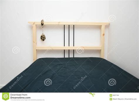 A Bed With Attached Handcuffs Stock Images Image 6027184