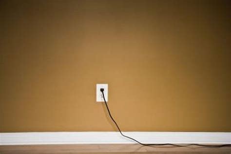 How To Keep A Power Cord From Unplugging Hunker Hide Electrical Cords