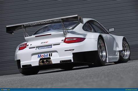Another detail shot of this 911 rsr, again highlighting the bold and sweeping martini graphic livery. AUSmotive.com » 2012 Porsche 911 GT3 RSR