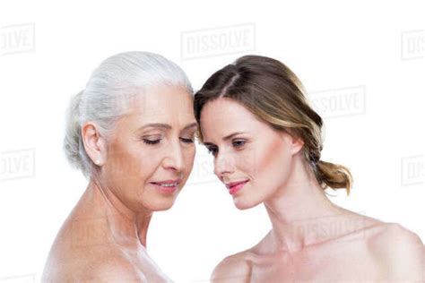 Naked Adult Daughter And Mother Isolated On White Purity Concept