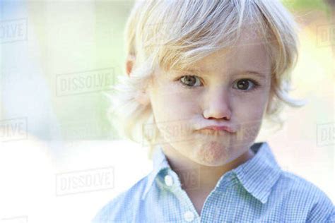 Little Boy Pouting Stock Photo Dissolve