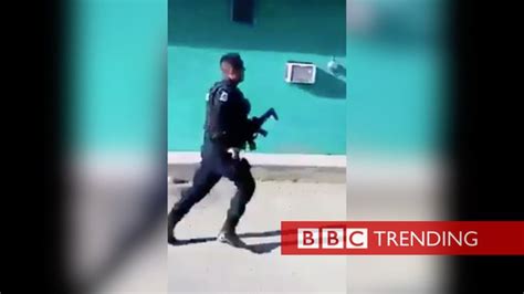 video of police fleeing crime scene before murder goes viral bbc news