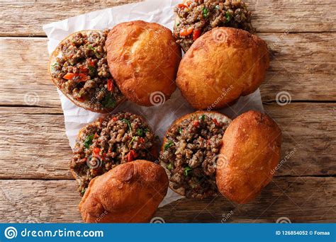 They are traditional cake doughnuts. South African Vetkoek Aka Fat Cake, Crispy Outside And Warm And Stock Photo - Image of deepfried ...