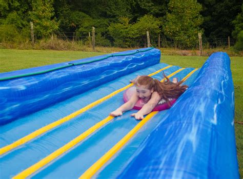 50 Foot Long Giant Inflatable Water Slip And Slide Affordable Moonwalk Rentals Covington
