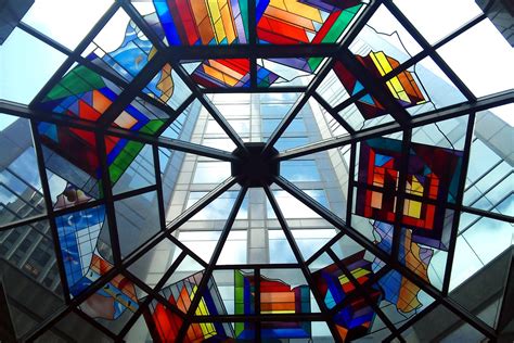 They can also be treated to become fireproof and bulletproof, thus ensuring safety. Stained Glass | Dundee Place, Toronto. | Ian Muttoo | Flickr