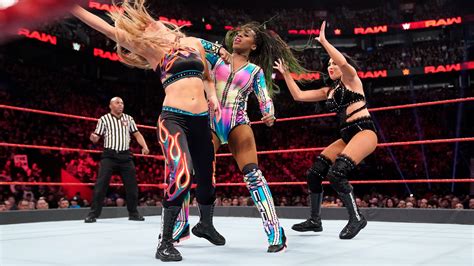Bayley Naomi Def WWE Womens Tag Team Champions The IIconics Big
