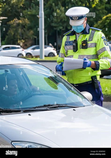 Bucharestromania Traffic Police Officer Writing A Ticket To A Female