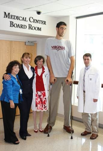This will give you the total height in centimeters. World's tallest man finally stops growing at 8 feet 3 ...