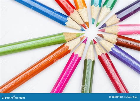 Coloured Pencils Arranged In A Radial Shape With The Tips Pointing