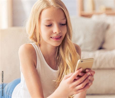 Teenage Girl With Gadget Stock Photo Adobe Stock