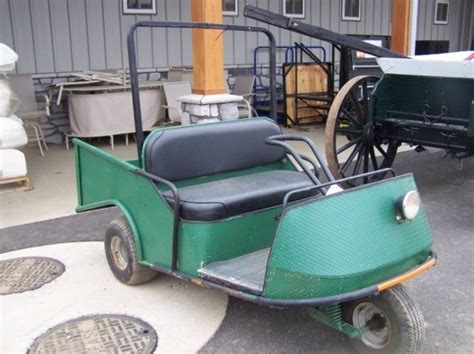 119f Antique Cushman Golf Cart Lot 0119f