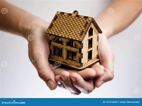 Hands With Wooden House Model Stock Photo Image Of Mortgage Holding