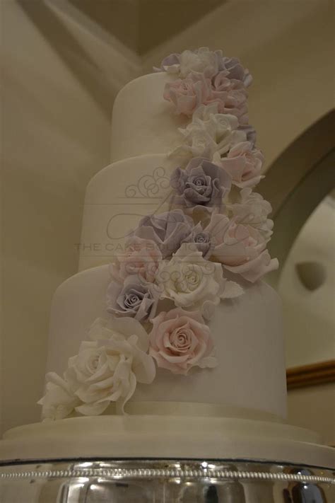 Cascading Rose Wedding Cake Decorated Cake By Amae Cakesdecor