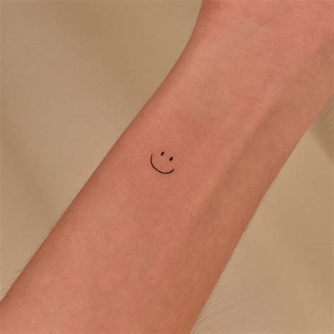 Minimalist Smiley Tattoo On The Wrist