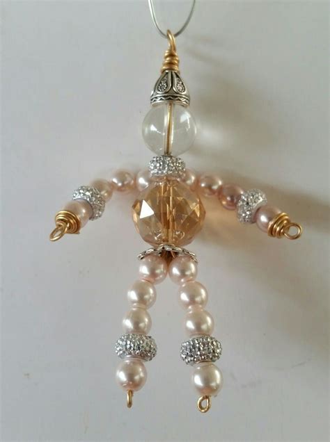 Golden beaded people | Drop earrings, Beaded, Jewelry