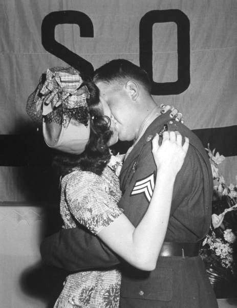 A Soldier Kissing His Bride After Their Wedding 1942 ~ World War Ii Other Pinterest