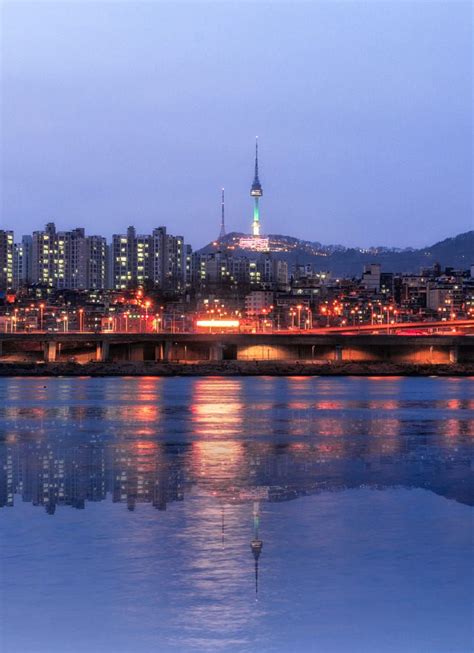 Seoul Tower And Hangang River At Night South Korea By Atakorn