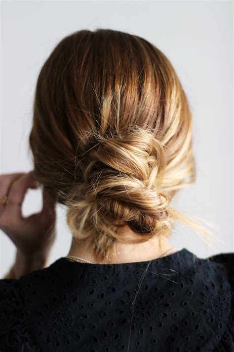A short, wispy fringe at the front can help to add softness and vulnerability to the look. The Messy Chignon | True Grit