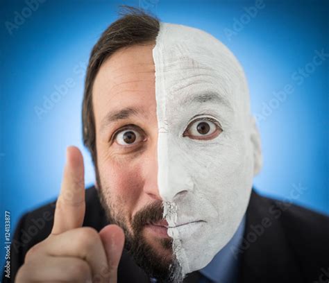 Conceptual Two Sides Face Portait Photo Of A Businessman Buy This