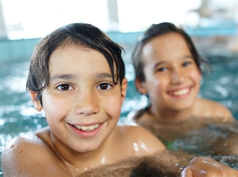 Premium Photo Happy Kids Enjoying On Summer Swimming Pool