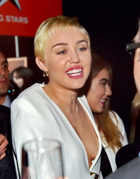 Miley Cyrus Braless Shows Cleavage Attending The W Magazine Shooting
