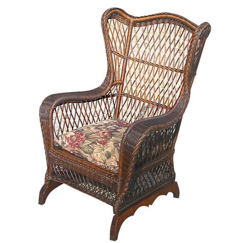 Padma's plantataion wing chair, kubu with white cushion. BAR HARBOR WICKER WING CHAIR at 1stdibs