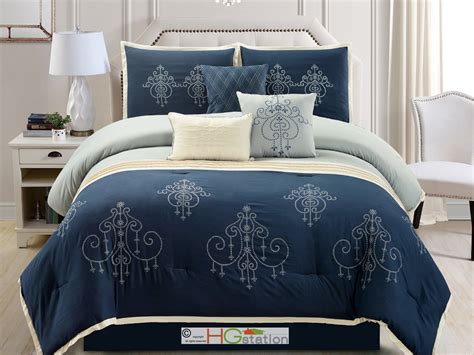This light blue comforter set offers a light and breezy feel thats perfect for summer. 7-P Chandelier Scroll Damask Embroidery Comforter Set Blue ...