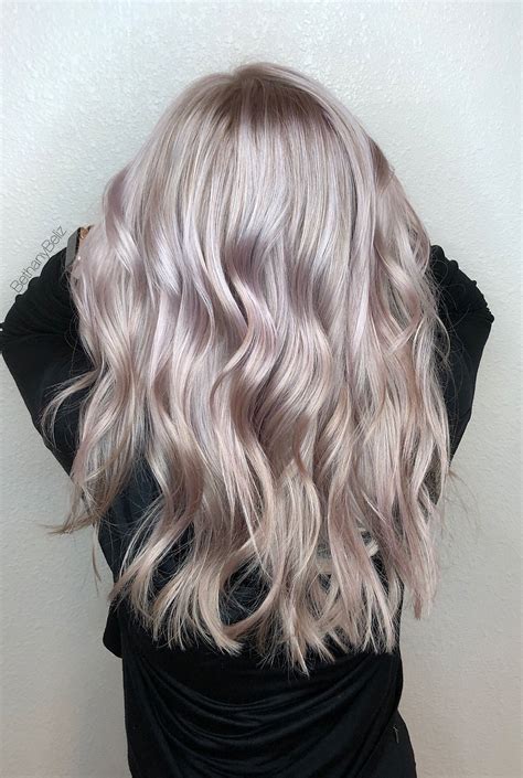 Platinum Blonde Highlights With A Lilac Glaze And A Long Layered