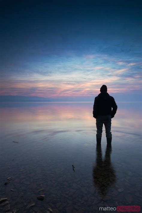 Matteo Colombo Travel Photography Lonely Man Standing In Water