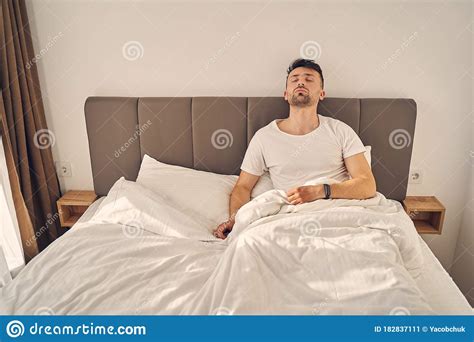Tired Brunette Man Trying To Sleep In His Bed Stock Image Image Of