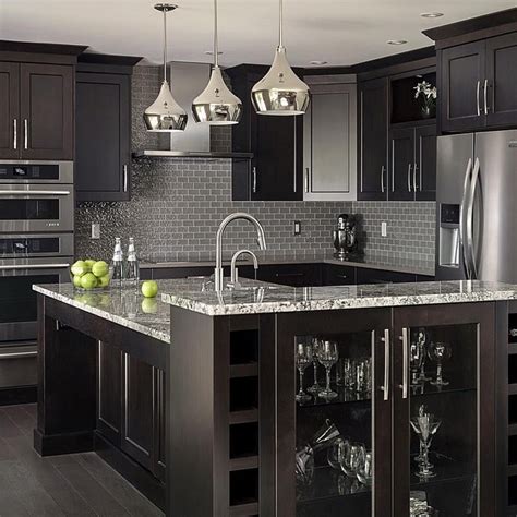 Streamlined designs, materials and textures. Black Kitchen Designs - The New 2021 Trend for A timeless ...