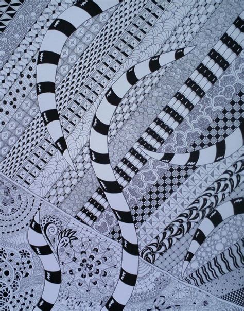 Black And White Artwork With An Intricate Design