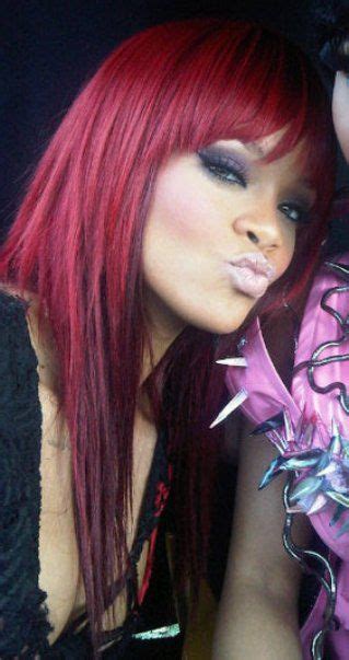 Rihannas Long Red Hairstyle With Bangs With Images Rihanna Red Hair
