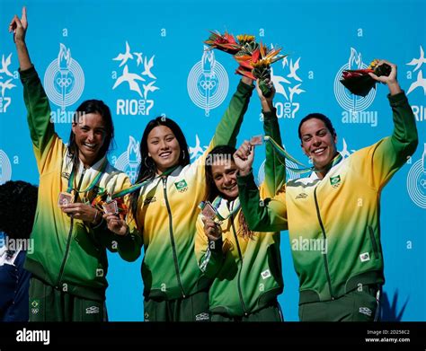 Brazilian Swimmers Celebrate On The Podium After Winning The Bronze