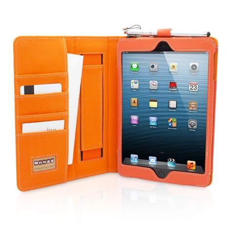 An Orange Ipad Case Sitting Open On Top Of A White Table