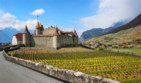 Panoramic View Of The Aigle Castle And Vineyards In Swiss Alps
